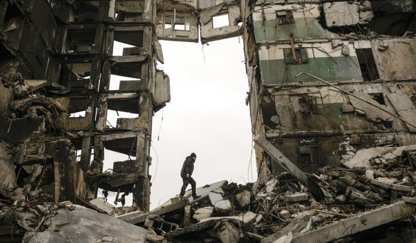 A resident looks for belongings in an apartment building destroyed during fighting between Ukrainian and Russian forces in Borodyanka, Ukraine, Tuesday, April 5, 2022. Ukrainian President Volodymyr Zelenskyy accused Russian troops of gruesome atrocities in Ukraine and told the U.N. Security Council on Tuesday that those responsible should immediately be brought up on war crimes charges in front of a tribunal like the one set up at Nuremberg after World War II. (AP Photo/Vadim Ghirda)