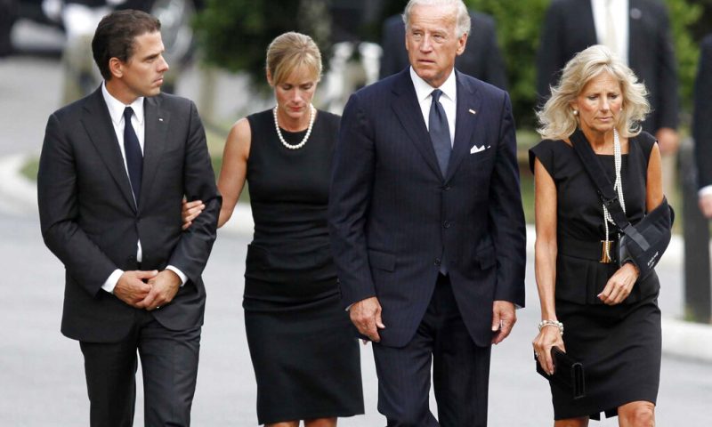 FILE - Hunter Biden walks with his then-wife Kathleen, along with Vice President Joe Biden and Jill Biden for the internment services for Sen. Edward Kennedy at Arlington National Cemetery in Arlington, Va, on Aug. 29, 2009. Kathleen Buhle, the ex-wife of President Joe Biden's son Hunter, says she has "total control over my life now," five years after her divorce, as she opens up about her marriage in a new memoir. (Jim Bourg/Pool via AP)