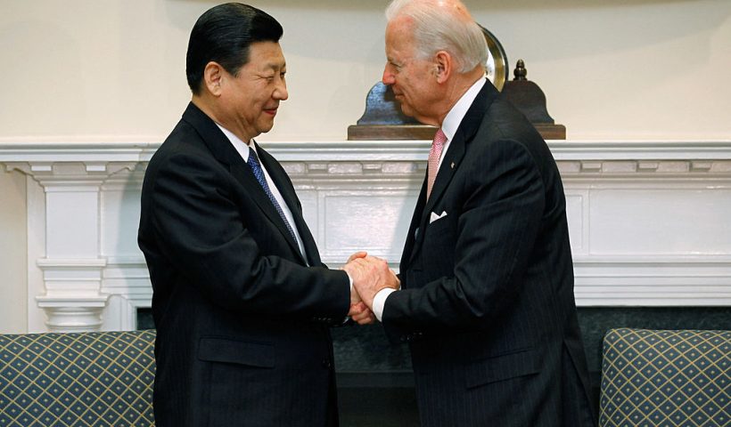 WASHINGTON, DC - FEBRUARY 14: (AFP OUT) U.S. Vice President Joe Biden (R) and Chinese Vice President Xi Jinping shake hands before an expanded bilateral meeting with other U.S. and Chinese officials in the Roosevelt Room at the White House February 14, 2012 in Washington, DC. While in Washington, Vice President Xi will meet with Biden, President Barack Obama and other senior Administration officials to discuss a broad range of bilateral, regional, and global issues. (Photo by Chip Somodevilla/Getty Images)