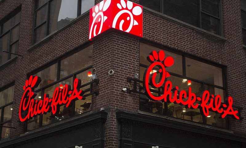 FILE PHOTO: A franchise sign is seen above a Chick-fil-A freestanding restaurant after its grand opening in Midtown, New York October 3, 2015. REUTERS/Rashid Umar Abbasi