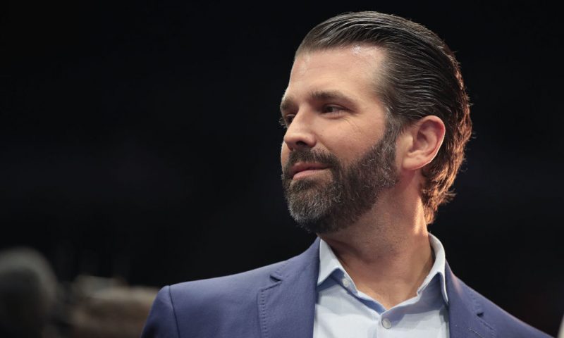 Donald Trump Jr. talks to the press before the arrival of his father President Donald Trump during a rally at the Van Andel Arena on March 28, 2019 in Grand Rapids, Michigan. (Photo by Scott Olson/Getty Images)