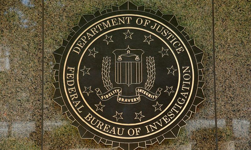 The FBI seal is seen outside the headquarters building in Washington, DC on July 5, 2016. - The FBI said Tuesday it will not recommend charges over Hillary Clinton's use of a private email server as secretary of state, but said she had been "extremely careless" in her handling of top secret data. The decision not to recommend prosecution will come as a huge relief for the presumptive Democratic nominee whose White House campaign has been dogged by the months-long probe. (Photo by YURI GRIPAS / AFP) (Photo credit should read YURI GRIPAS/AFP via Getty Images)