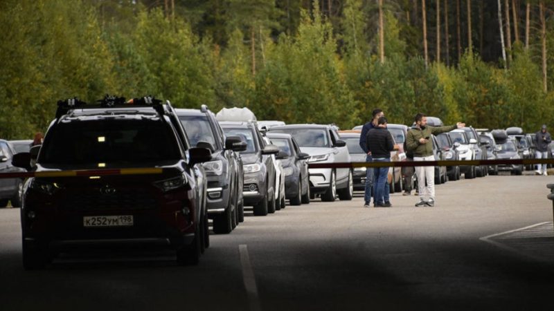 Cars coming from Russia wait in long lines at the border checkpoint between Russia and Finland near Vaalimaa on Thursday. (Photo by OLIVIER MORIN/AFP via Getty Images)AFP VIA GETTY IMAGES