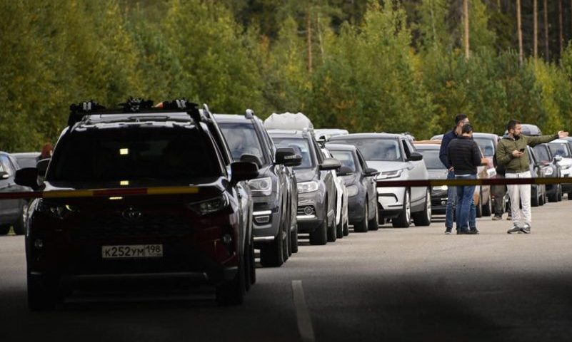Cars coming from Russia wait in long lines at the border checkpoint between Russia and Finland near Vaalimaa on Thursday. (Photo by OLIVIER MORIN/AFP via Getty Images)AFP VIA GETTY IMAGES