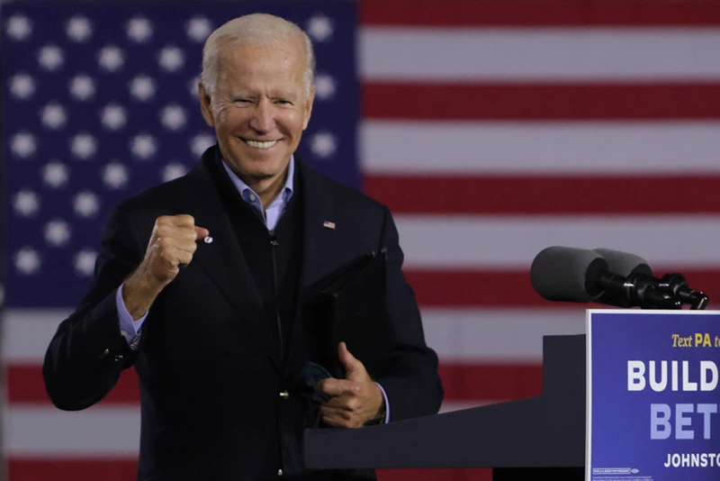 Joe Biden gestures during a campaign stop outside Johnstown Train Station September 30, 2020. (Photo by Alex Wong/Getty Images)