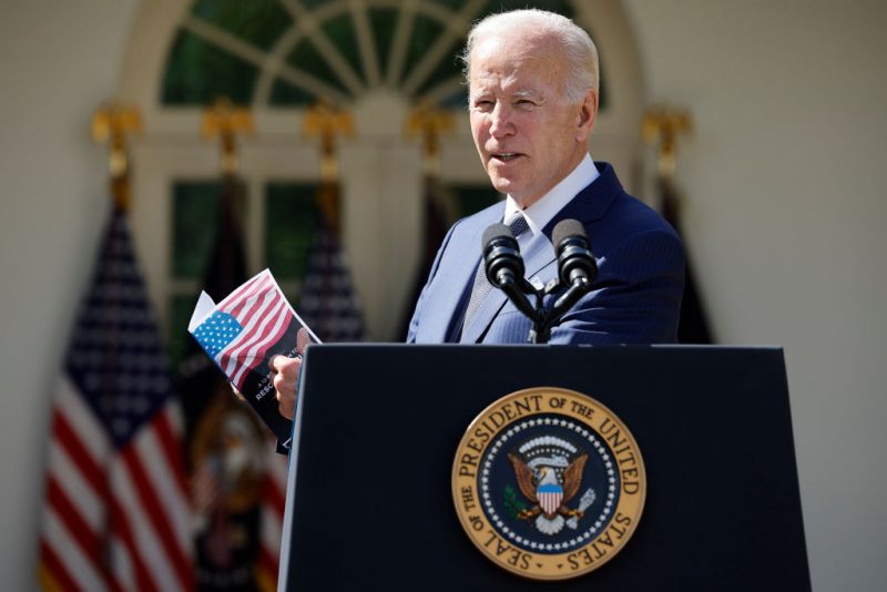 WASHINGTON, DC - SEPTEMBER 27: U.S. President Joe Biden holds up a piece of paper he says highlights a plan by Sen. Rick Scott (R-FL) while delivering remarks about lowering health care costs in the Rose Garden at the White House on September 27, 2022 in Washington, DC. Biden's remarks "focused on lowering health care costs and protecting and strengthening Medicare and Social Security," according to the White House. (Photo by Chip Somodevilla/Getty Images)