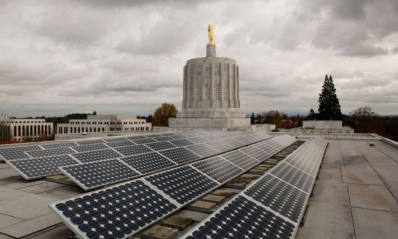 SALEM, OR - NOVEMBER 14: Photovoltaic solar panels are mounted on the west wing roof of the Oregon State Capitol November 14, 2005 in Salem, Oregon. The 60 panels cover 850 square feet and produce 8.4 peak kilowatts, or enough energy to power two efficient homes. Oregon is the first state to have a solar electric power system on its capitol building, a project that underscores Oregon's support for renewable energy projects. (Photo by Melanie Conner/Getty Images)