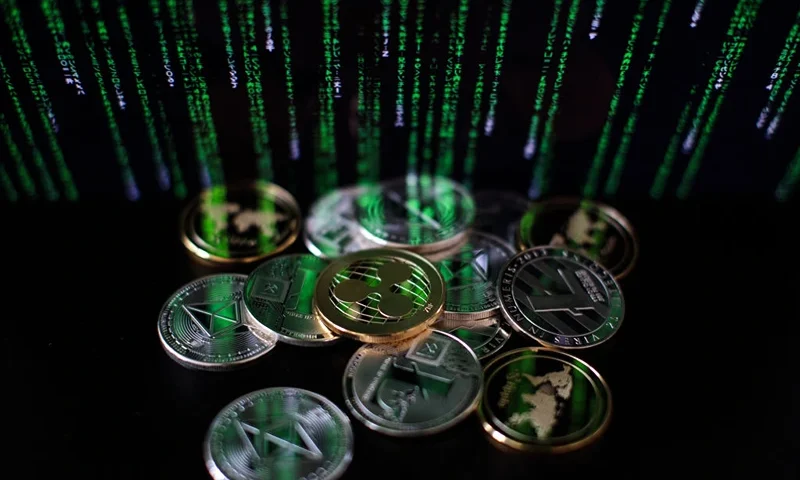 The litecoin, ripple and ethereum cryptocurrency 'altcoins' sit arranged in London, England. To use digital currencies, digital infrastructure must first be in place — but governments cannot impose on their citizens to have it. Photo: Jack Taylor/Getty Images