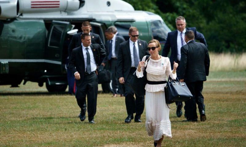 US first lady Melania Trump's chief of staff Lindsay Reynolds (C) arrives at the US ambassador's residence Winfield House in London on July 12, 2018. - The four-day trip, which will include talks with Prime Minister Theresa May, tea with Queen Elizabeth II and a private weekend in Scotland, is set to be greeted by a leftist-organised mass protest in London on Friday. (Photo by Brendan Smialowski / AFP) (Photo credit should read BRENDAN SMIALOWSKI/AFP via Getty Images)
