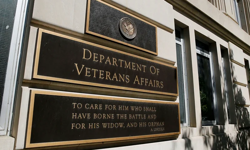 The sign of the Department of Veteran Affairs is seen in front of the headquarters building in Washington, May 23, 2014. REUTERS/Larry Downing/File Photo