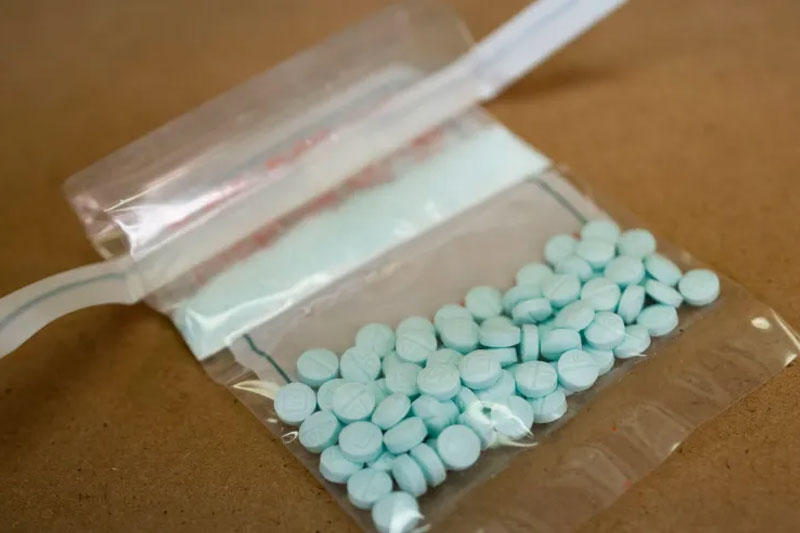 Tablets believed to be laced with fentanyl are displayed at the Drug Enforcement Administration Northeast Regional Laboratory on October 8, 2019 in New York. - According to US government data, about 32,000 Americans died from opioid overdoses in 2018. That accounts for 46 percent of all fatal overdoses. Fentanyl, a powerful painkiller approved by the US Food and Drug Administration for a range of conditions, has been central to the American opioid crisis which began in the late 1990s. (Photo by Don EMMERT / AFP) (Photo by DON EMMERT/AFP via Getty Images)