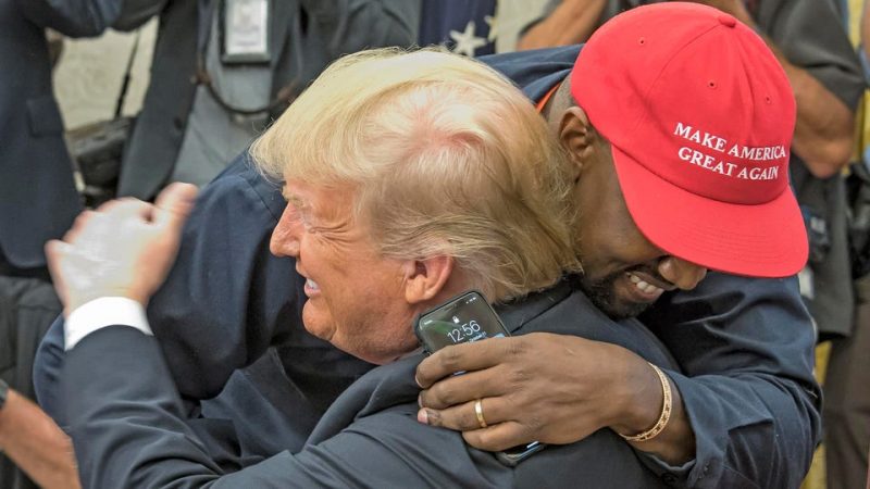 Donald Trump and Kanye West hug at the Oval Office in 2018.GETTY IMAGES