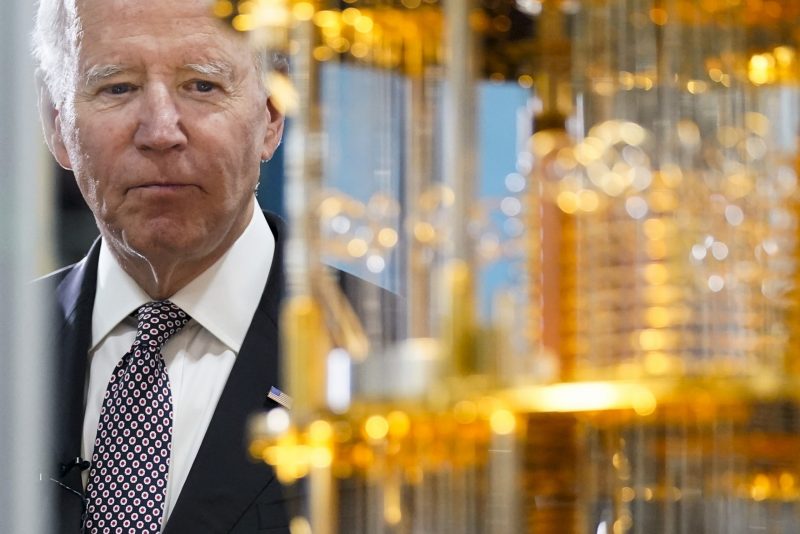 President Joe Biden looks at the IBM System One quantum computer during a tour of an IBM facility in Poughkeepsie, N.Y., on Thursday Oct. 6, 2022. (AP Photo/Andrew Harnik)