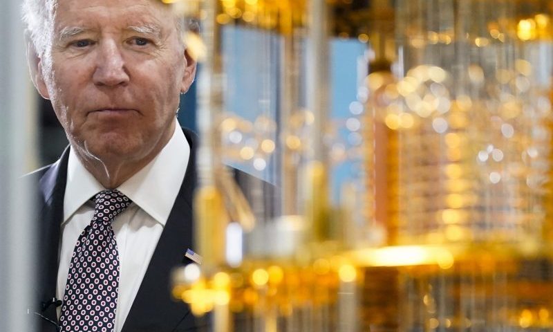 President Joe Biden looks at the IBM System One quantum computer during a tour of an IBM facility in Poughkeepsie, N.Y., on Thursday Oct. 6, 2022. (AP Photo/Andrew Harnik)