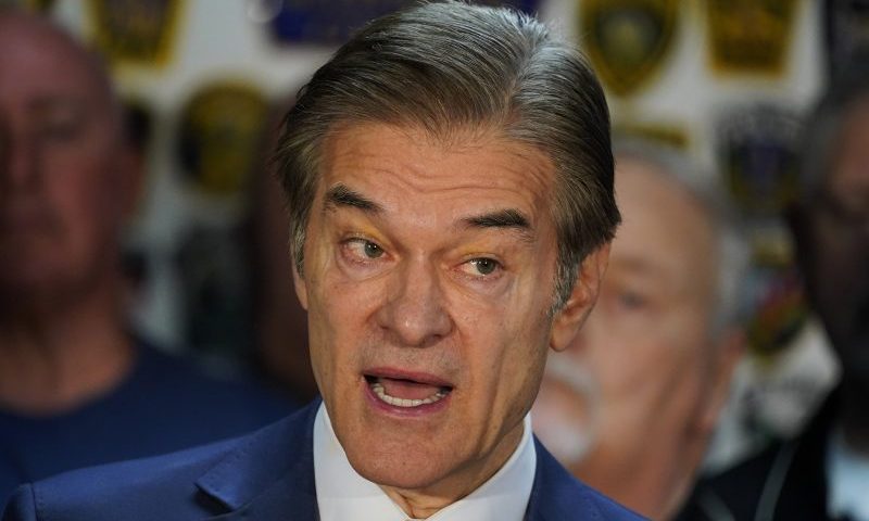 Dr. Mehmet Oz, Republican candidate for U.S. Senate in Pennsylvania, visits the Fraternal Order of Police Lodge 91 in West Homestead, Pa., Tuesday, Oct. 18, 2022. (AP Photo/Gene J. Puskar)