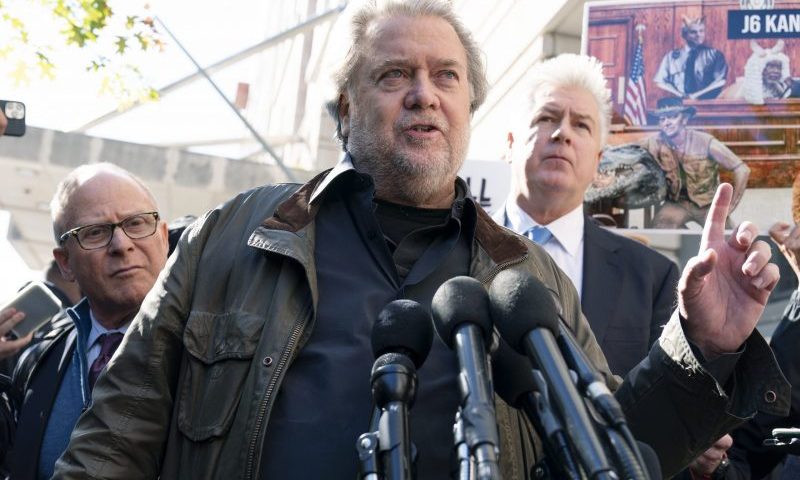 Steve Bannon, center, a longtime ally of former President Donald Trump and convicted of contempt of Congress, accompanied by his attorneys David Schoen, left, and Evan Corcoran, right, speaks to the media as he leaves the federal courthouse on Friday, Oct. 21, 2022, in Washington. Bannon was sentenced to 4 months behind bars for defying a Jan. 6 committee subpoena. ( AP Photo/Jose Luis Magana)