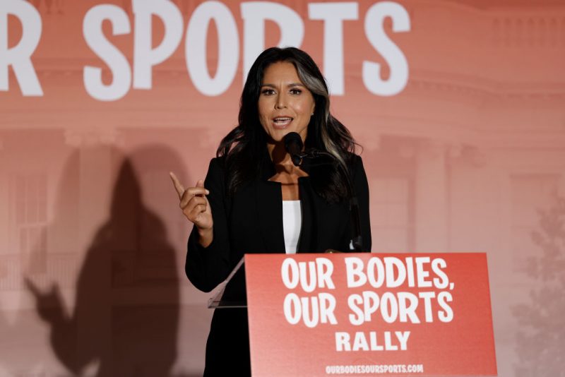 WASHINGTON, DC - JUNE 23: Former U.S. Rep. Tulsi Gabbard (D-HI) speaks at an "Our Bodies, Our Sports" rally to mark the 50th anniversary of Title IX at Freedom Plaza on June 23, 2022 in Washington, DC. The rally, organized by multiple athletic women's groups was held to call on U.S. President Joe Biden to put restrictions on transgender females and "advocate to keep women's sports female."(Photo by Anna Moneymaker/Getty Images)