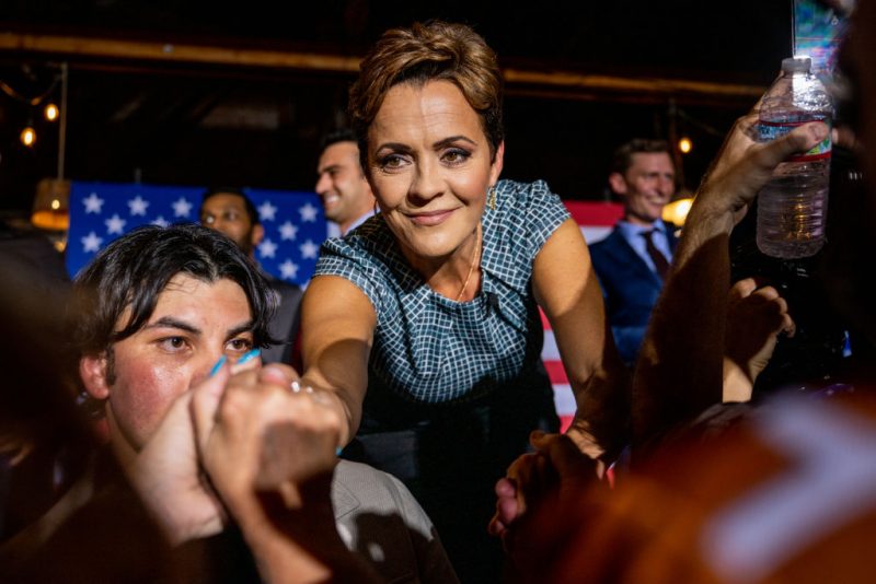 PHOENIX, ARIZONA - AUGUST 01: Republican gubernatorial candidate Kari Lake greets supporters after speaking at a campaign event on the eve of the primary, attended also by U.S. senatorial candidate Blake Masters at the Duce bar on August 01, 2022 in Phoenix, Arizona. Lake, who has the endorsement of former President Donald Trump, is facing Karrin Taylor Robson, who is being backed by former Vice President Mike Pence. (Photo by Brandon Bell/Getty Images)