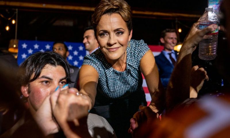 PHOENIX, ARIZONA - AUGUST 01: Republican gubernatorial candidate Kari Lake greets supporters after speaking at a campaign event on the eve of the primary, attended also by U.S. senatorial candidate Blake Masters at the Duce bar on August 01, 2022 in Phoenix, Arizona. Lake, who has the endorsement of former President Donald Trump, is facing Karrin Taylor Robson, who is being backed by former Vice President Mike Pence. (Photo by Brandon Bell/Getty Images)