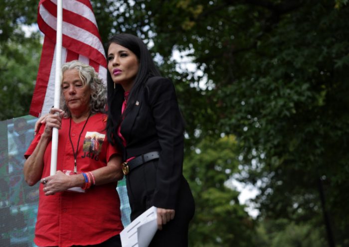 WASHINGTON, DC - SEPTEMBER 24: Micki Witthoeft (L), mother of Ashli Babbitt, is comforted by emcee Cara Castronuova during a prayer at a “January 6th Solidarity Truth Rally” near the U.S. Capitol on September 24, 2022 in Washington, DC. Demonstrators who support people who have been prosecuted in the January 6th insurrection at the U.S. Capitol gather at the rally “to stand united and show our strength in numbers by protesting conservative political persecution in the heart of the American capitol.” (Photo by Alex Wong/Getty Images)