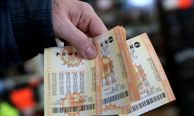 SAN LORENZO, CA - JANUARY 13: A customer holds a handful of Powerball tickets at Kavanagh Liquors on January 13, 2016 in San Lorenzo, California. Dozens of people lined up outside of Kavanagh Liquors, a store that has had several multi-million dollar winners, to -purchase Powerball tickets in hopes of winning the estimated record-breaking $1.5 billion dollar jackpot. (Photo by Justin Sullivan/Getty Images)