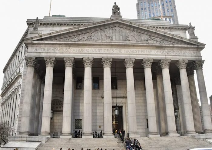 The New York state Supreme Court has reinstated all employees who were fired for not being vaccinated, ordering back pay and saying their rights had been violated. (Mike Coppola/Getty Images)
