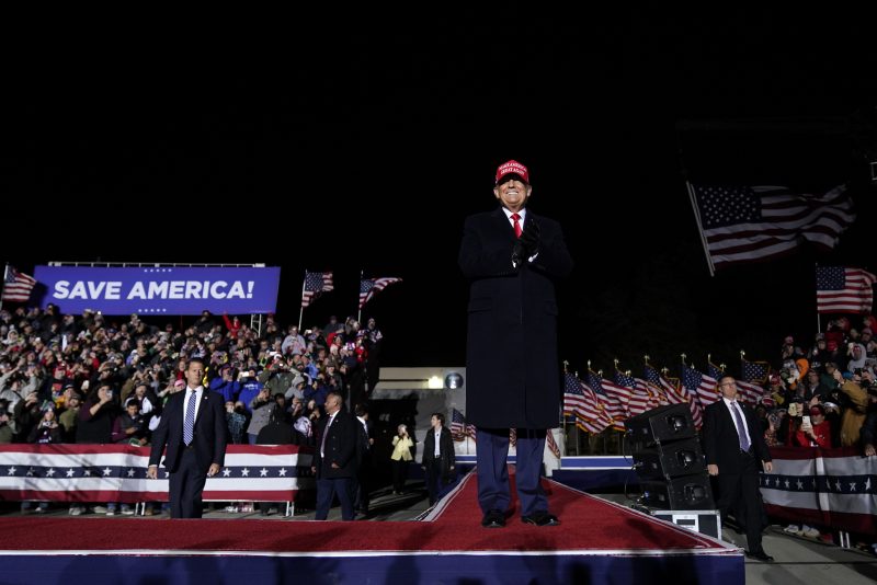 Former President Donald Trump arrives to speak at a rally, Thursday, Nov. 3, 2022, in Sioux City, Iowa. (AP Photo/Charlie Neibergall)