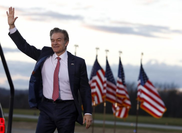 Republican candidate for U.S. Senate Dr. Mehmet Oz waves before addressing an election rally in Latrobe, Pa. Saturday, Nov. 5, 2022, before former President Donald Trump speaks. (AP Photo/Jacqueline Larma)
