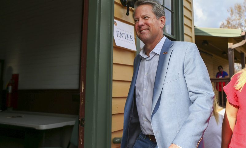 Republican candidate for Georgia Governor Gov. Brian Kemp arrives to vote Tuesday, Nov. 8, 2022 in Winterville, Ga. (AP Photo/Brett Davis)
