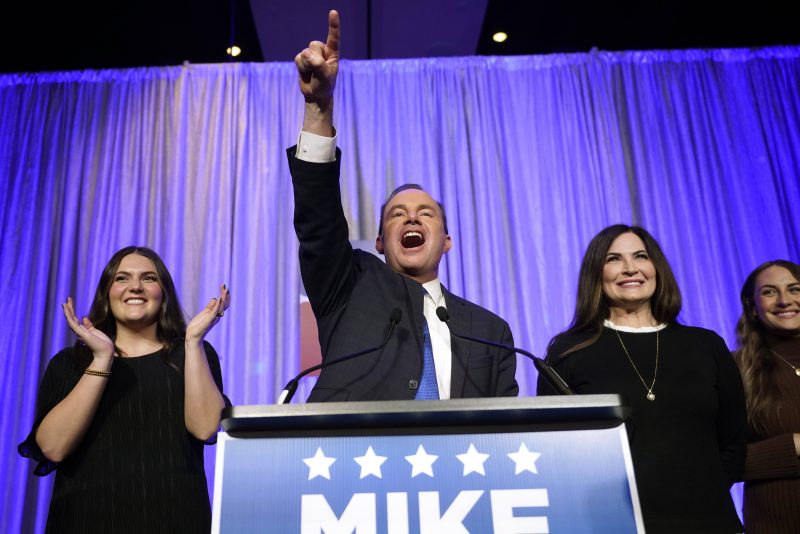 Utah Republican Sen. Mike Lee celebrates as he speaks to supporters during an election night party on Tuesday, Nov. 8, 2022, in Salt Lake City. (AP Photo/Rick Bowmer)