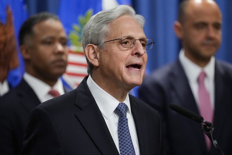 Assistant Attorney General for the Criminal Division Kenneth Polite and U.S. Attorney for the District of Columbia Matthew Graves, right, listen, as Attorney General Merrick Garland announces Jack Smith as special counsel to oversee the Justice Department's investigation into the presence of classified documents at former President Donald Trump's Florida estate and aspects of a separate probe involving the Jan. 6 insurrection and efforts to undo the 2020 election, at the Justice Department in Washington, Friday, Nov. 18, 2022. (AP Photo/Andrew Harnik)