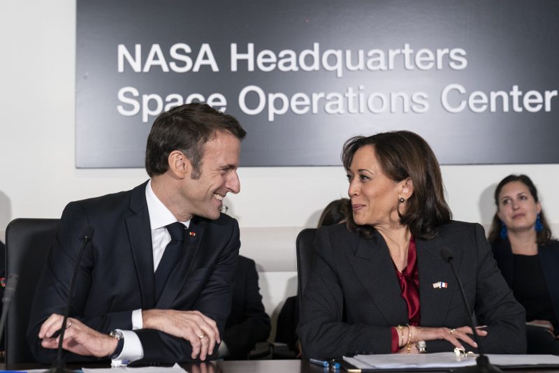 French President Emmanuel Macron, left, and Vice President Kamala Harris speak during a meeting to highlight space cooperation between the two countries, at NASA headquarters in Washington, Wednesday, Nov. 30, 2022. (AP Photo/Alex Brandon)