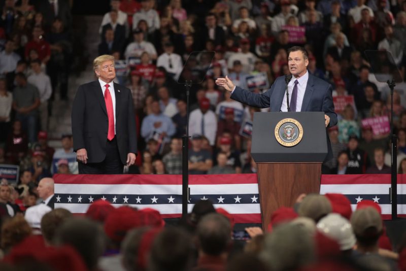 Republican candidate for governor of Kansas Kris Kobach speaks at a rally with President Donald Trump at the Kansas Expocenter on October 6, 2018 in Topeka, Kansas.  Trump scored a political victory today when Judge Brett Kavanaugh was confirmed by the Senate to become the next Supreme Court justice.  (Photo by Scott Olson/Getty Images)