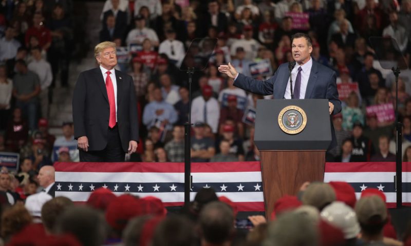 Republican candidate for governor of Kansas Kris Kobach speaks at a rally with President Donald Trump at the Kansas Expocenter on October 6, 2018 in Topeka, Kansas. Trump scored a political victory today when Judge Brett Kavanaugh was confirmed by the Senate to become the next Supreme Court justice. (Photo by Scott Olson/Getty Images)