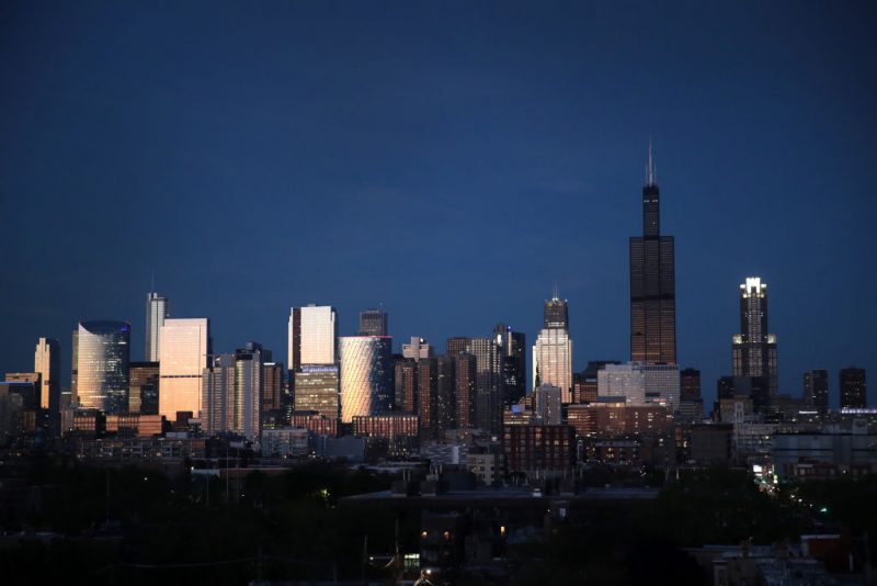 HICAGO, ILLINOIS - MAY 20: The Willis Tower rises above the downtown skyline as a blackened mass after flooding caused by recent heavy rains knocked out power to the building Monday on May 20, 2020 in Chicago, Illinois. The Willis Tower, constructed as the Sears Tower, was once the world's tallest building. (Photo by Scott Olson/Getty Images)