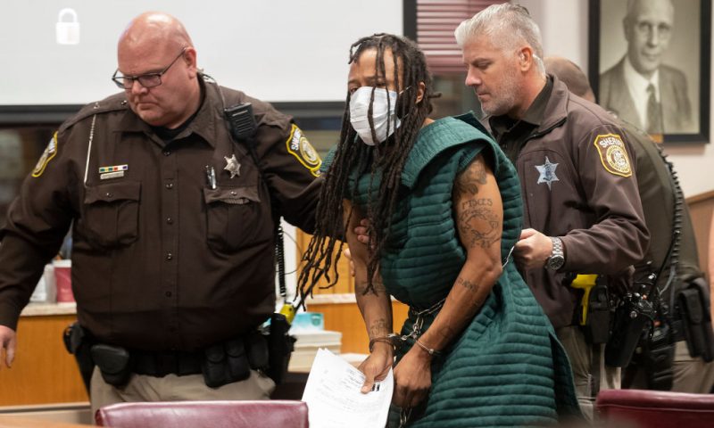 Darrell Brooks (C) appears at Waukesha County Court on November 23, 2021 in Waukesha, Wisconsin. Brooks is charged with killing five people and injuring nearly 50 after driving through a Christmas parade with his sport utility vehicle on November 21. (Photo by Mark Hoffman-Pool/Getty Images)