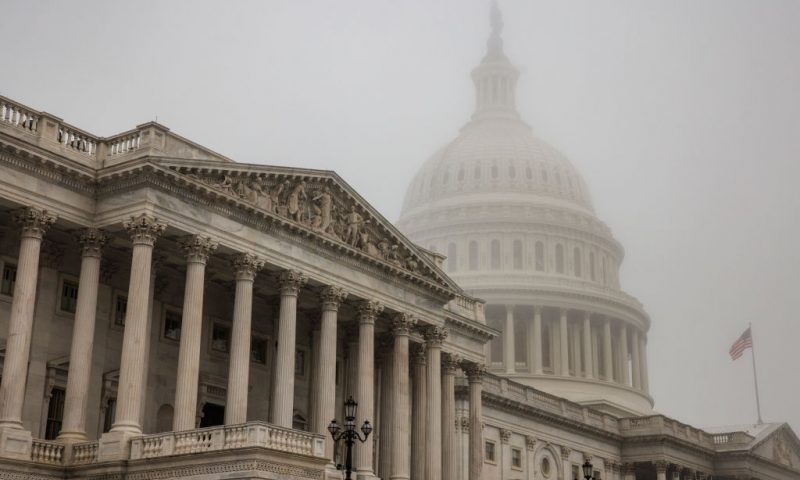 WASHINGTON, DC - NOVEMBER 04: Early morning fog envelopes the U.S. Capitol dome behind the U.S. House of Representatives on November 4, 2022 in Washington, DC. Republicans are poised to regain control of the U.S. Congress in the midterm elections on November 8 after the Democrats gained the majority in both the House in 2018 and Senate in 2020. (Photo by Samuel Corum/Getty Images)