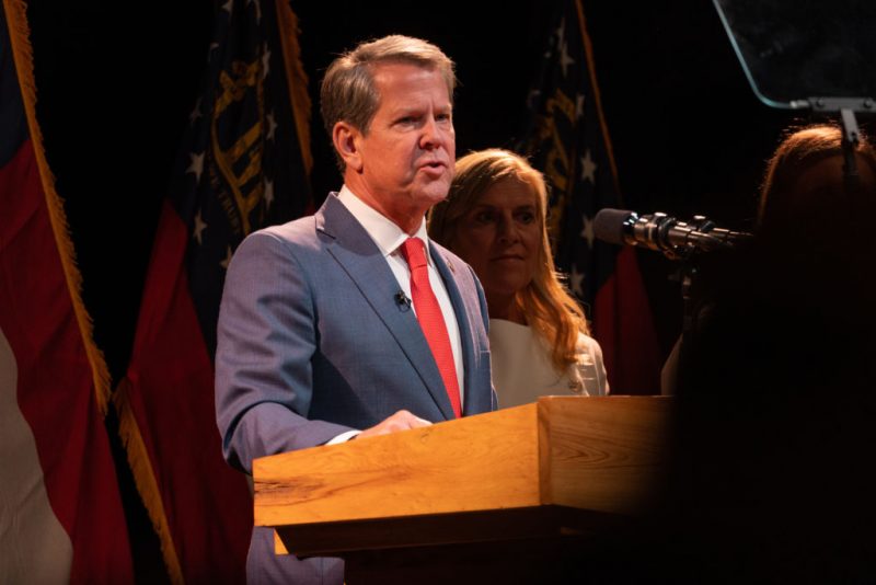 ATLANTA, GA - NOVEMBER 08: Republican Gov. Brian Kemp addresses his supporters with wife Marty at a watch party after winning re-election on November 8, 2022 in Atlanta, Georgia. Kemp defeated Democratic challenger Stacey Abrams in a rematch of their 2018 race. (Photo by Megan Varner/Getty Images)
