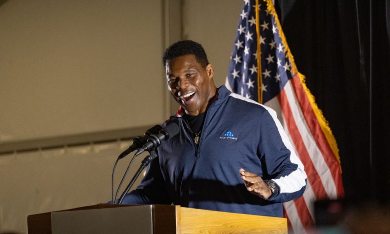 Republican U.S. Senate candidate Herschel Walker speaks at a rally at The Mill on Etowah on November 10, 2022 in Canton, Georgia. The University of Georgia 1982 Heisman Trophy winner and former NFL running back faces incumbent Sen. Raphael Warnock (D-GA) in a runoff on December 6. (Photo by Megan Varner/Getty Images)