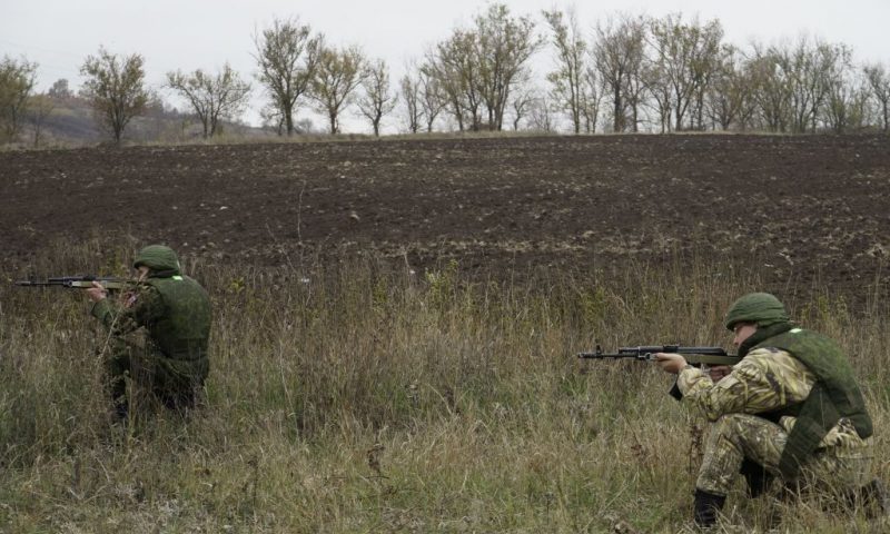 Military volunteers and civilians take a shooting training at a range in Rostov region on November 11, 2022, amid the ongoing Russian military action in Ukraine. (Photo by STRINGER / AFP) (Photo by STRINGER/AFP via Getty Images)