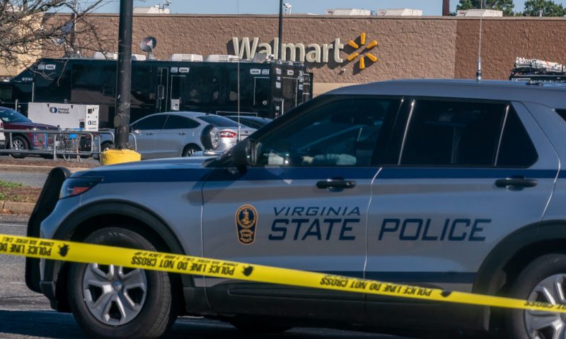 A police tape is seen at the site of a fatal shooting in a Walmart on November 23, 2022 in Chesapeake, Virginia. Following the Tuesday night shooting, six people were killed, including the suspected gunman. (Photo by Nathan Howard/Getty Images)