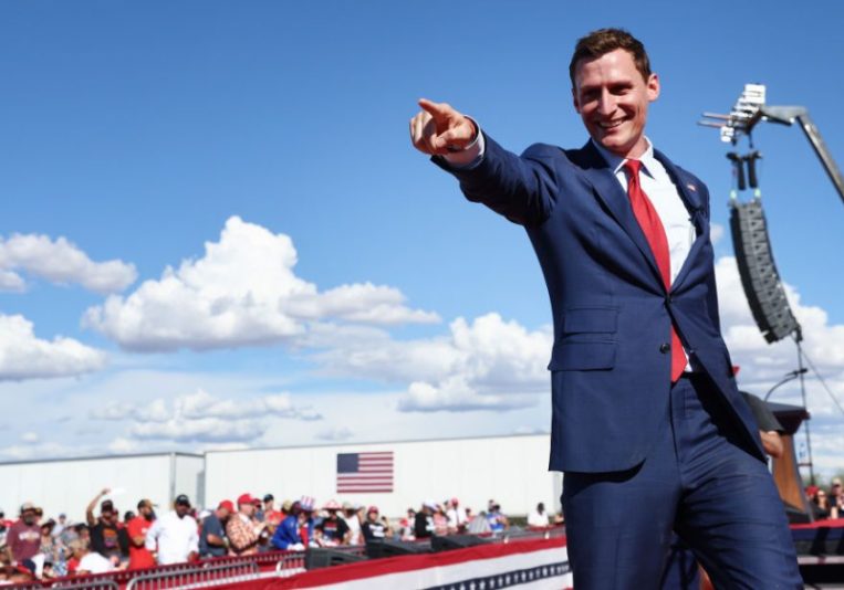 MESA, ARIZONA - OCTOBER 09: Republican candidate for U.S. Senate Blake Masters gestures to the crowd at a campaign rally attended by former U.S. President Donald Trump at Legacy Sports USA on October 09, 2022 in Mesa, Arizona. Trump was stumping for Arizona GOP candidates, including gubernatorial nominee Kari Lake, ahead of the midterm election on November 8. (Photo by Mario Tama/Getty Images)