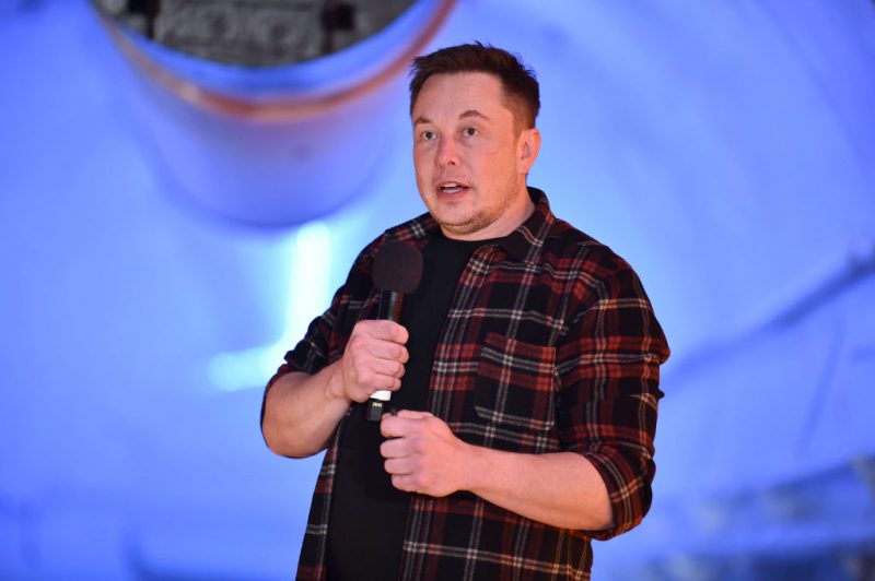 Elon Musk, co-founder and chief executive officer of Tesla Inc., speaks during an unveiling event for the Boring Company Hawthorne test tunnel in Hawthorne, south of Los Angeles, California on December 18, 2018. - Musk explained that the snail moves 14 times faster than a tunnel-digging machine. On Tuesday night December 18, 2018, Boring Co. officially opened the Hawthorne tunnel, a preview of Elon Musk's larger vision to ease L.A. traffic. (Photo by Robyn Beck / POOL / AFP) (Photo credit should read ROBYN BECK/AFP via Getty Images)