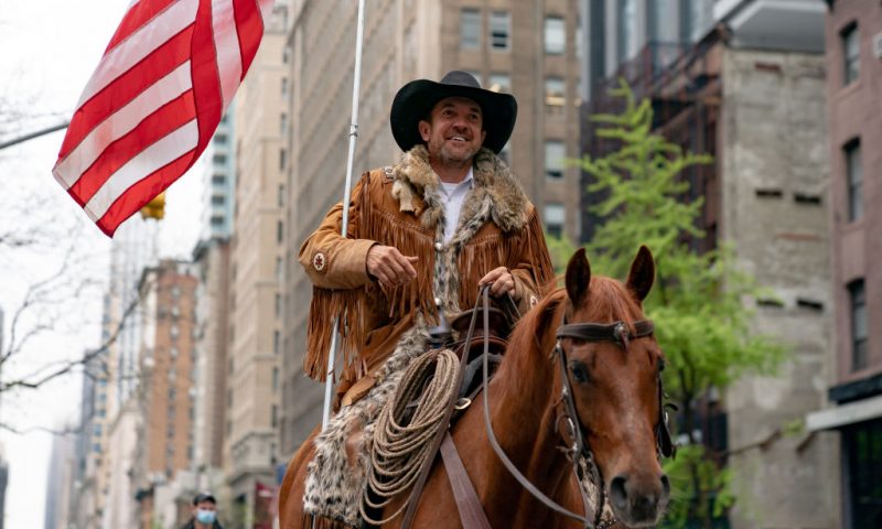 Otero County Commission Chairman and Cowboys for Trump co-founder Couy Griffin rides his horse on 5th avenue on May 1, 2020 in New York City. Mayor Bill De Blasio said that New York city has seen a decline in coronavirus hospitalizations and the rate of people testing positive for the disease, but that reopening is still a few months away.(Photo by Jeenah Moon/Getty Images)