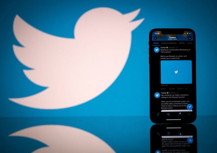 This photograph taken on October 26, 2020 shows the logo of US social network Twitter displayed on the screen of a smartphone and a tablet in Toulouse, southern France. (Photo by Lionel BONAVENTURE / AFP) (Photo by LIONEL BONAVENTURE/AFP via Getty Images)