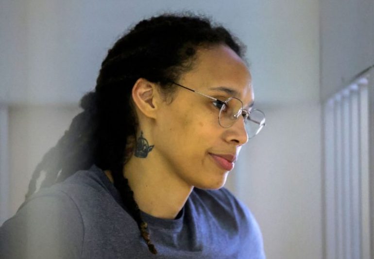 US Women's National Basketball Association (WNBA) basketball player Brittney Griner, who was detained at Moscow's Sheremetyevo airport and later charged with illegal possession of cannabis, waits for the verdict inside a defendants' cage during a hearing in Khimki outside Moscow, on August 4, 2022. - A Russian court found Griner guilty of smuggling and storing narcotics after prosecutors requested a sentence of nine and a half years in jail for the athlete. (Photo by EVGENIA NOVOZHENINA / POOL / AFP) (Photo by EVGENIA NOVOZHENINA/POOL/AFP via Getty Images)