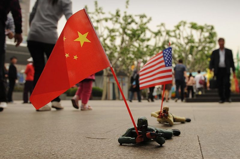 Toy soldiers, one with a Chinese flag and one with a US flag are seen for sale on a street in Shanghai on May 3, 2012. The United States said it was ready to help Chinese dissident Chen Guangcheng if he sought exile, after the blind activist expressed fears for his safety and pleaded to be taken abroad. AFP PHOTO/Peter PARKS (Photo credit should read PETER PARKS/AFP/GettyImages)