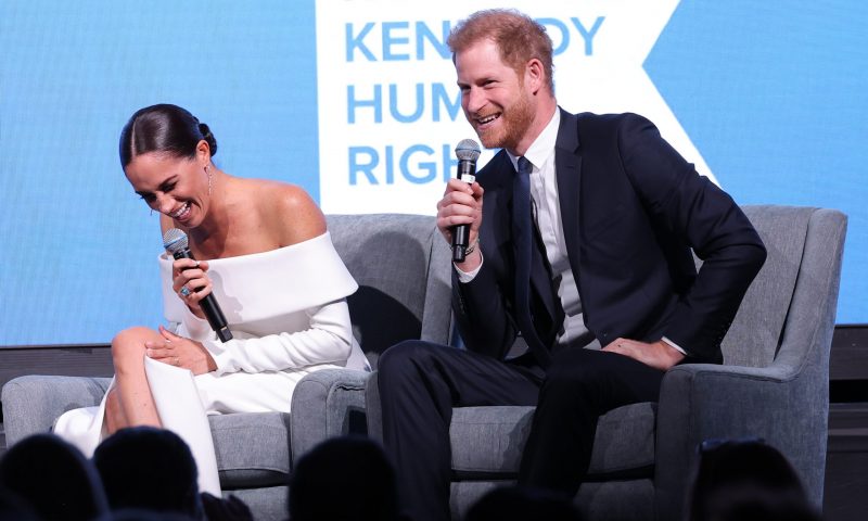 NEW YORK, NEW YORK - DECEMBER 06: Meghan, Duchess of Sussex and Prince Harry, Duke of Sussex speak onstage at the 2022 Robert F. Kennedy Human Rights Ripple of Hope Gala at New York Hilton on December 06, 2022 in New York City. (Photo by Mike Coppola/Getty Images for 2022 Robert F. Kennedy Human Rights Ripple of Hope Gala)