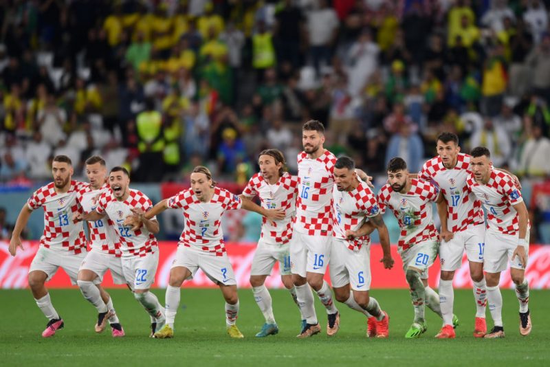 Croatia players celebrate their win via a penalty shootout during the FIFA World Cup Qatar 2022 quarter final match between Croatia and Brazil at Education City Stadium on December 09, 2022 in Al Rayyan, Qatar. (Photo by Justin Setterfield/Getty Images)