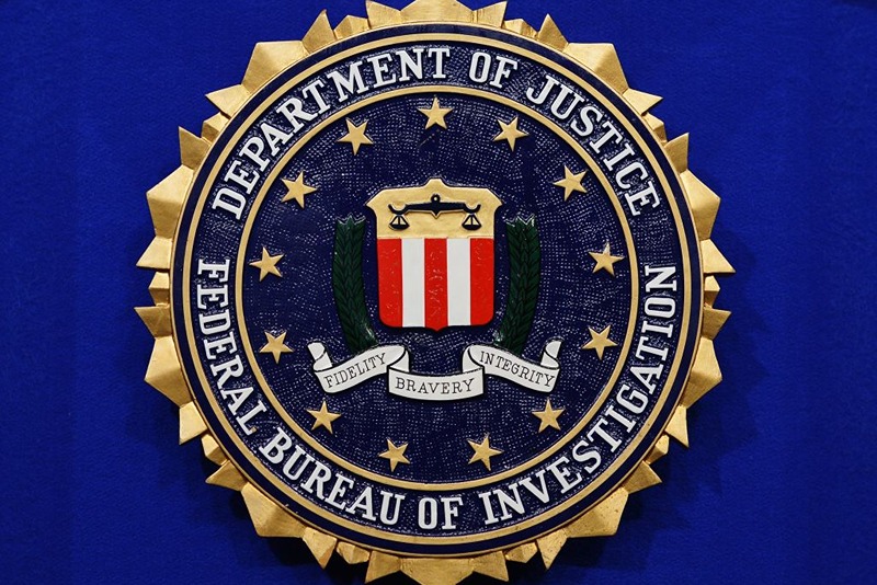 The Federal Bureau of Investigation (FBI) seal is seen on the lectern following a press conference announcing the FBI's 499th and 500th additions to the 